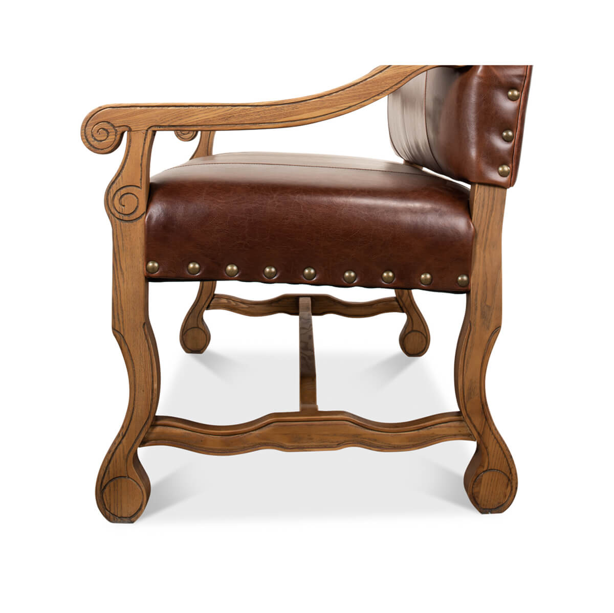 Close-up of settee’s arm and leg wood carvings.