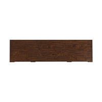 Dresser top view, dark wood surface.