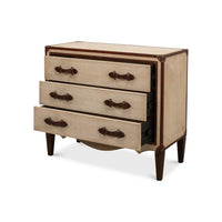 Art deco commode with drawers partially open.