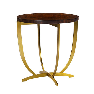 Round side table with gold curved legs, perspective view.