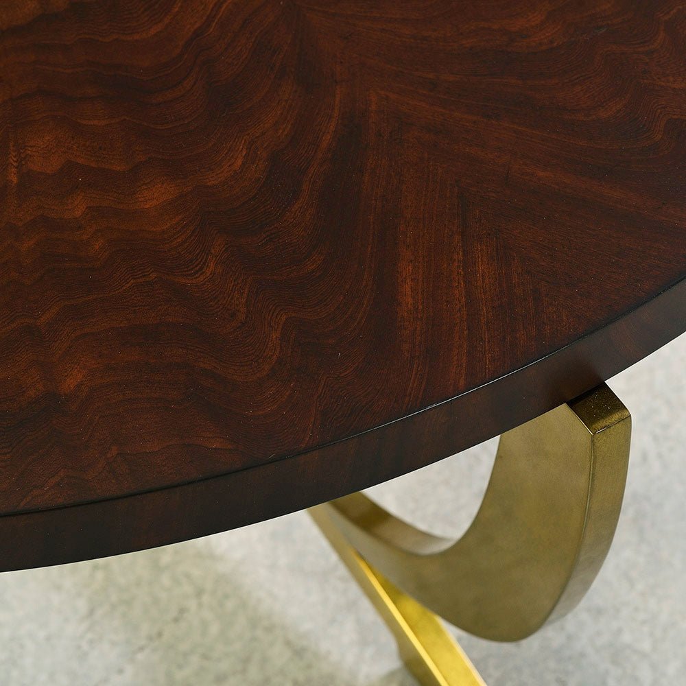Wood texture detail on round side table top.