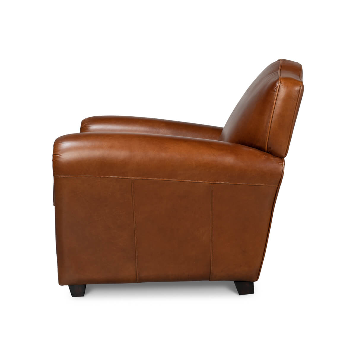 Brown leather club chair left side view.