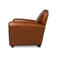 Brown leather club chair left side view.