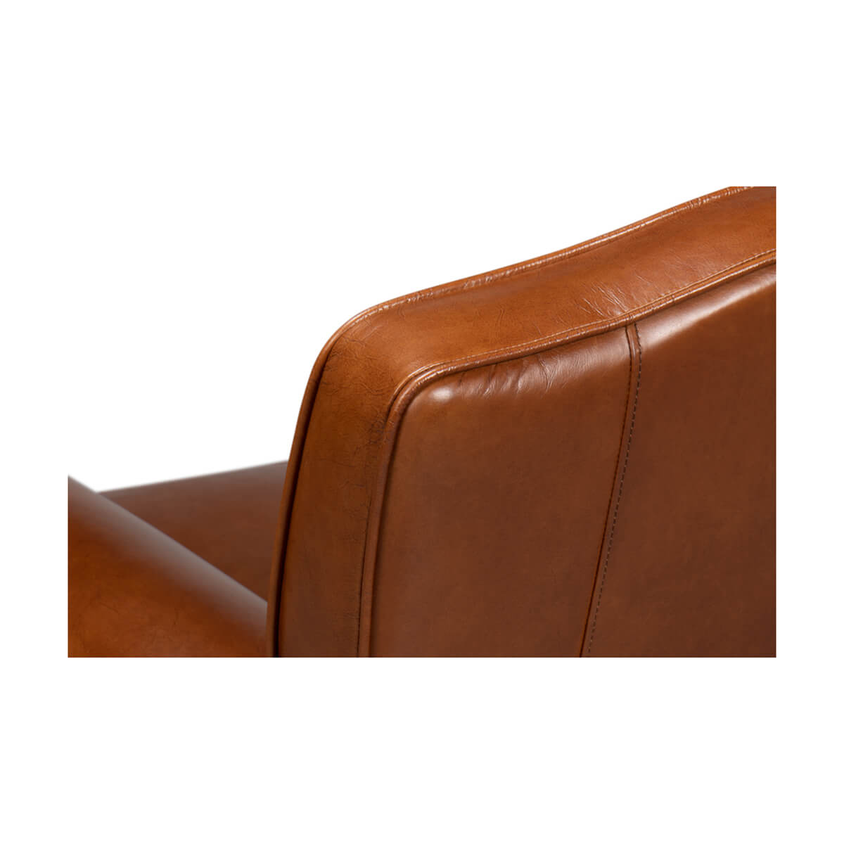 Backrest stitching detail on brown leather club chair.