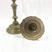 Underside of French bronze candlestick, base details shown.