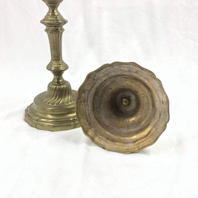 Underside of French bronze candlestick, base details shown.