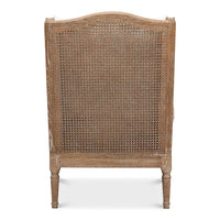 Back view of French caned armchair, showcasing cane detail.