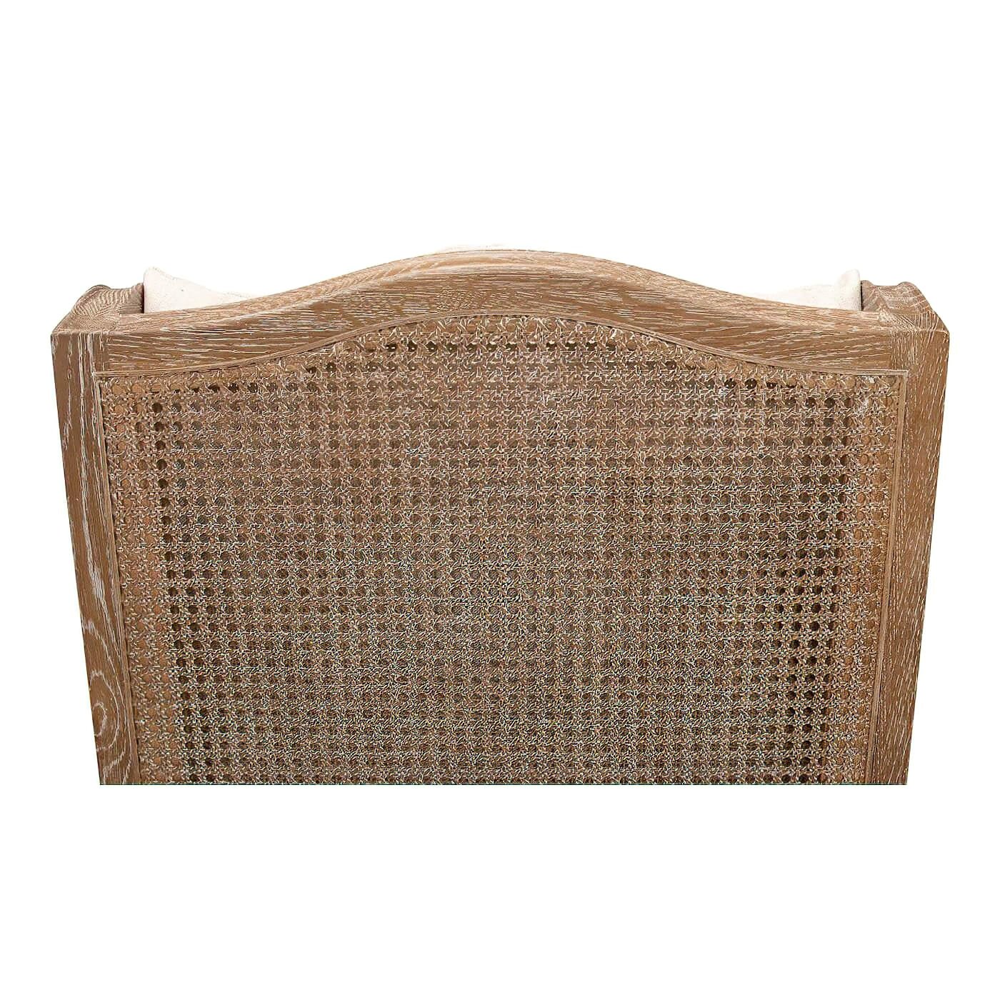 Top of backrest showing cane pattern on armchair.