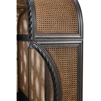 Close-up of French caned king bed headboard detail.