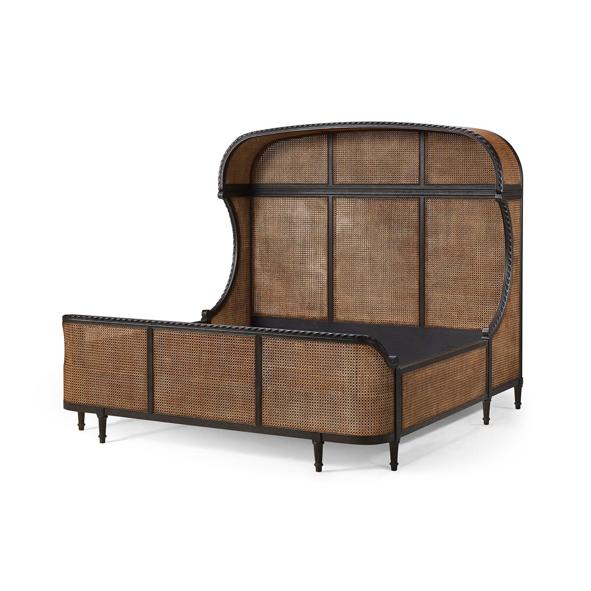 French caned king bed frame without mattress or pillows.