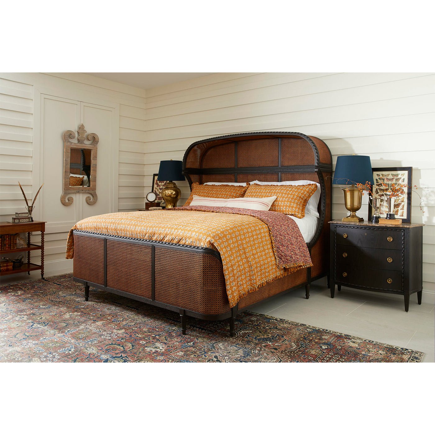 French caned king bed in room setting with decor.