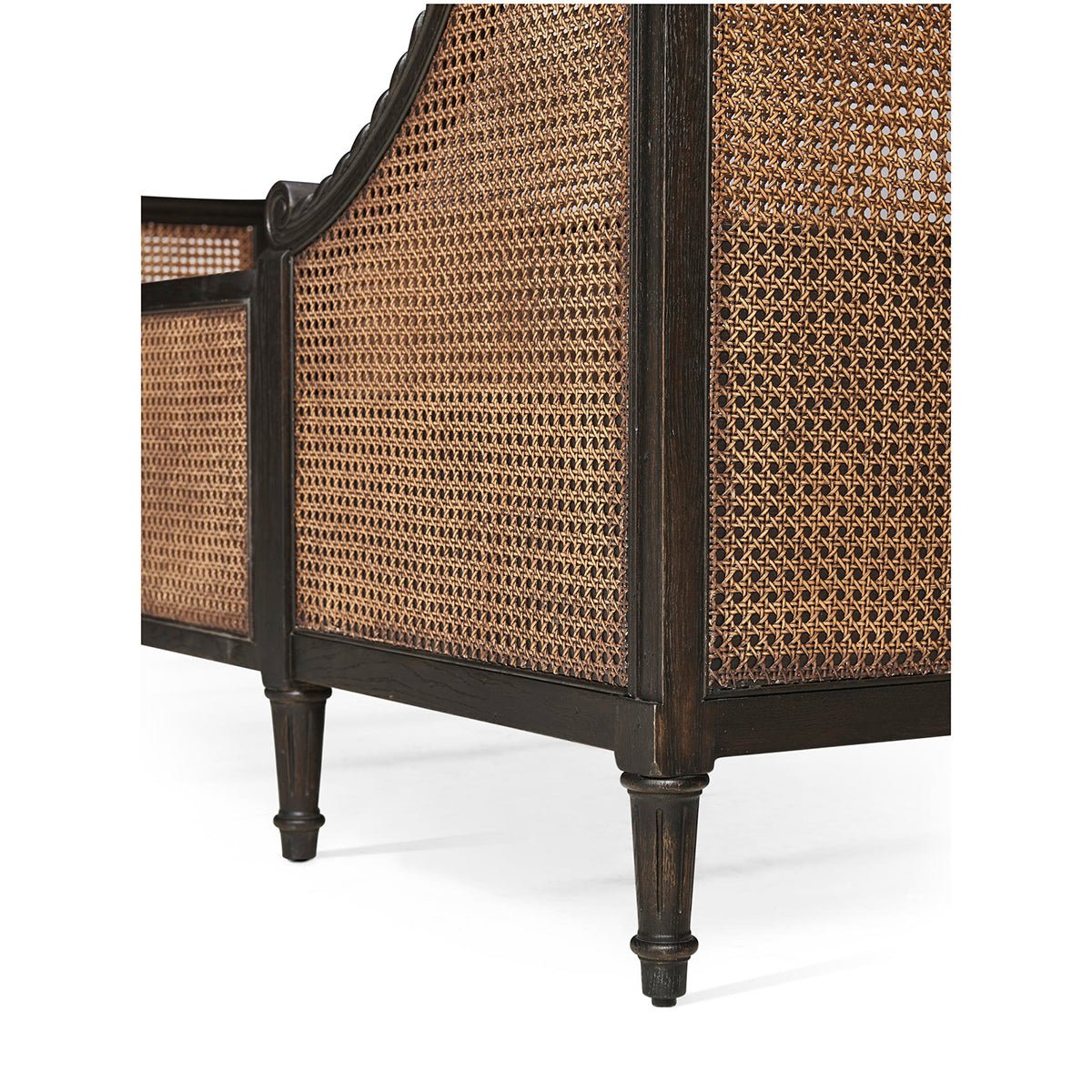Corner legs of French caned king bed frame.