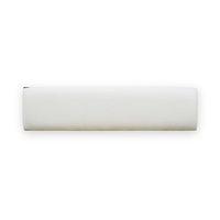 Top view of wooden bench's white upholstery.