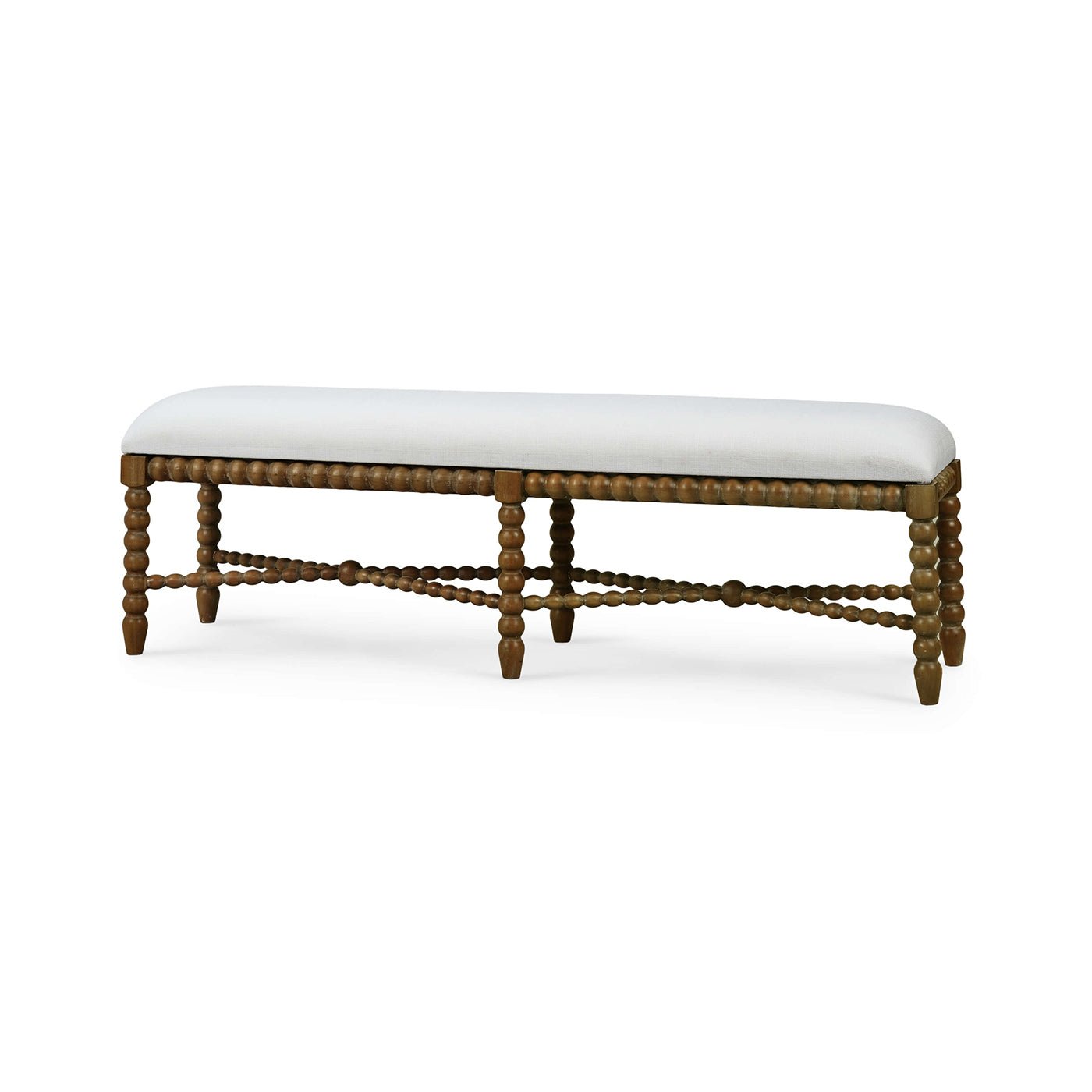 Side view of wooden bench with white upholstery.