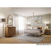 Styled bedroom featuring wooden bench with alternate finish.