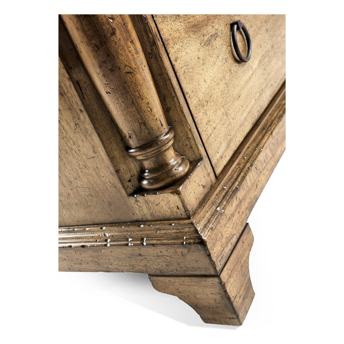 Close-up of chest corner with decorative column.
