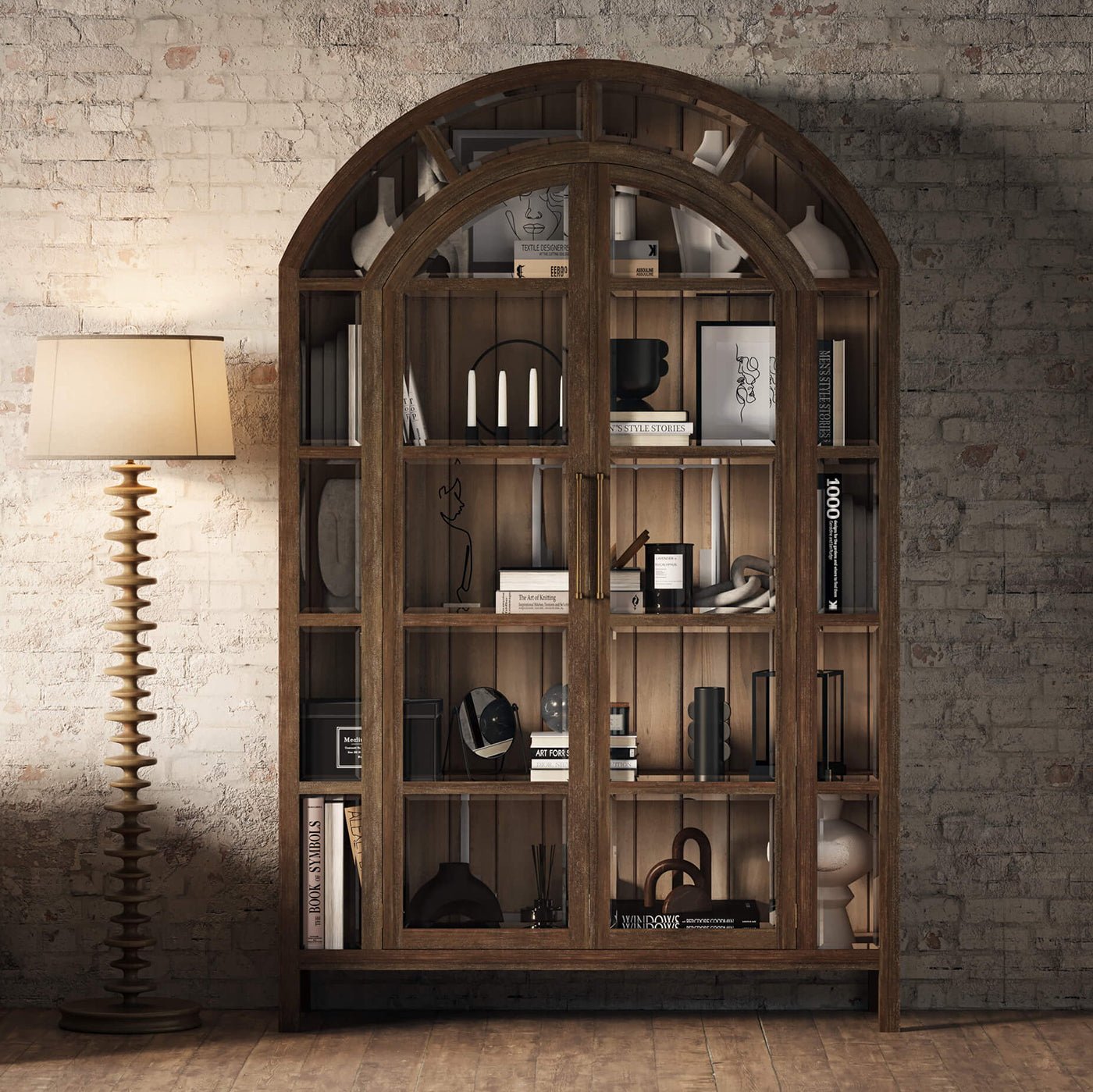 French country cabinet styled with books and decor.