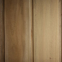 Wood texture on French country display cabinet.
