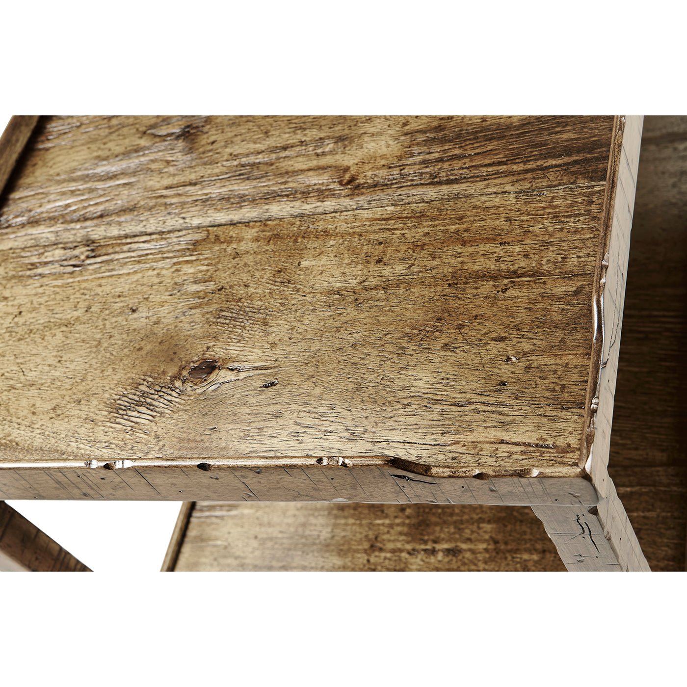 Corner detail on French country end table in wood.