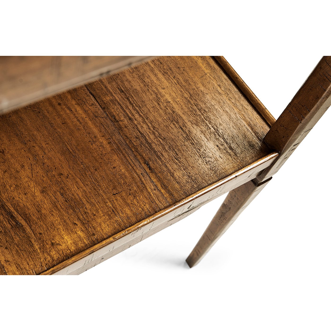 Detailed view of lower shelf, French Country end table.