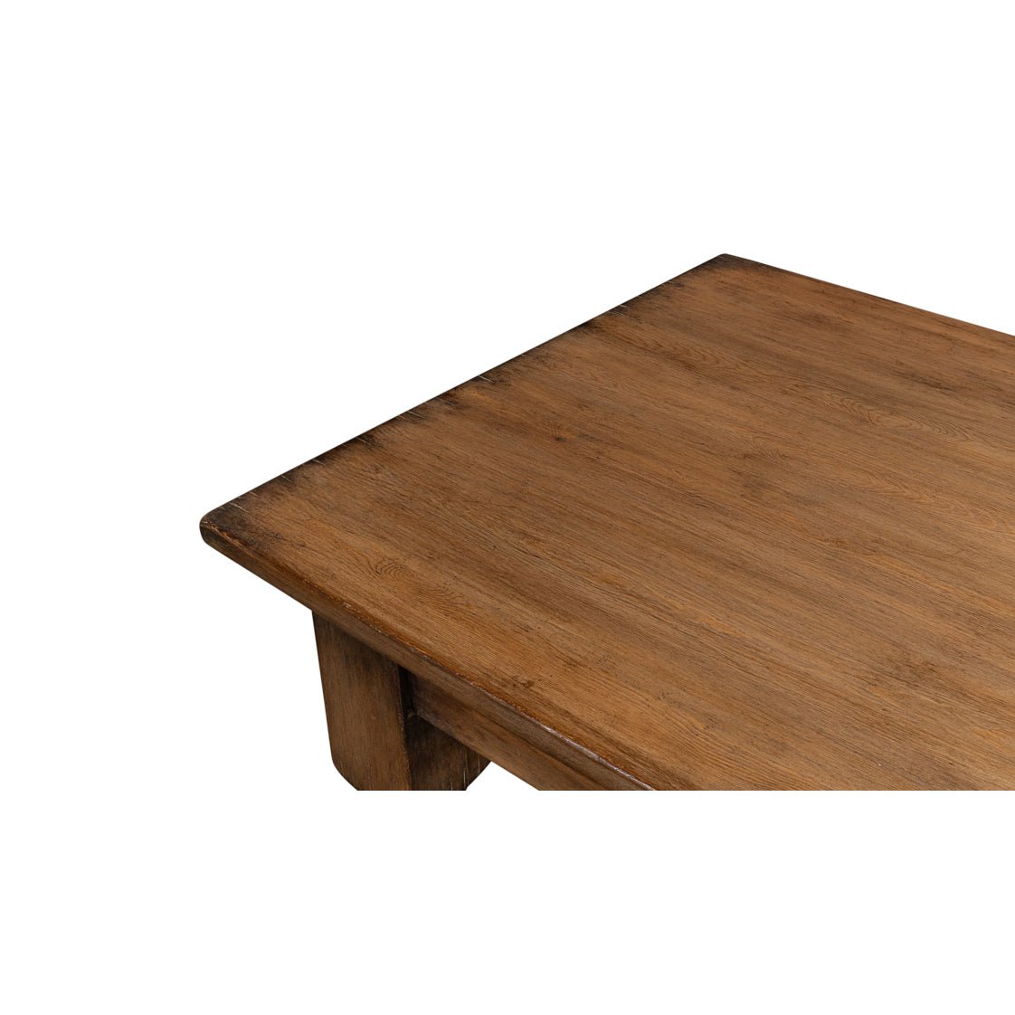 Close-up of dining table corner, wood grain detail.