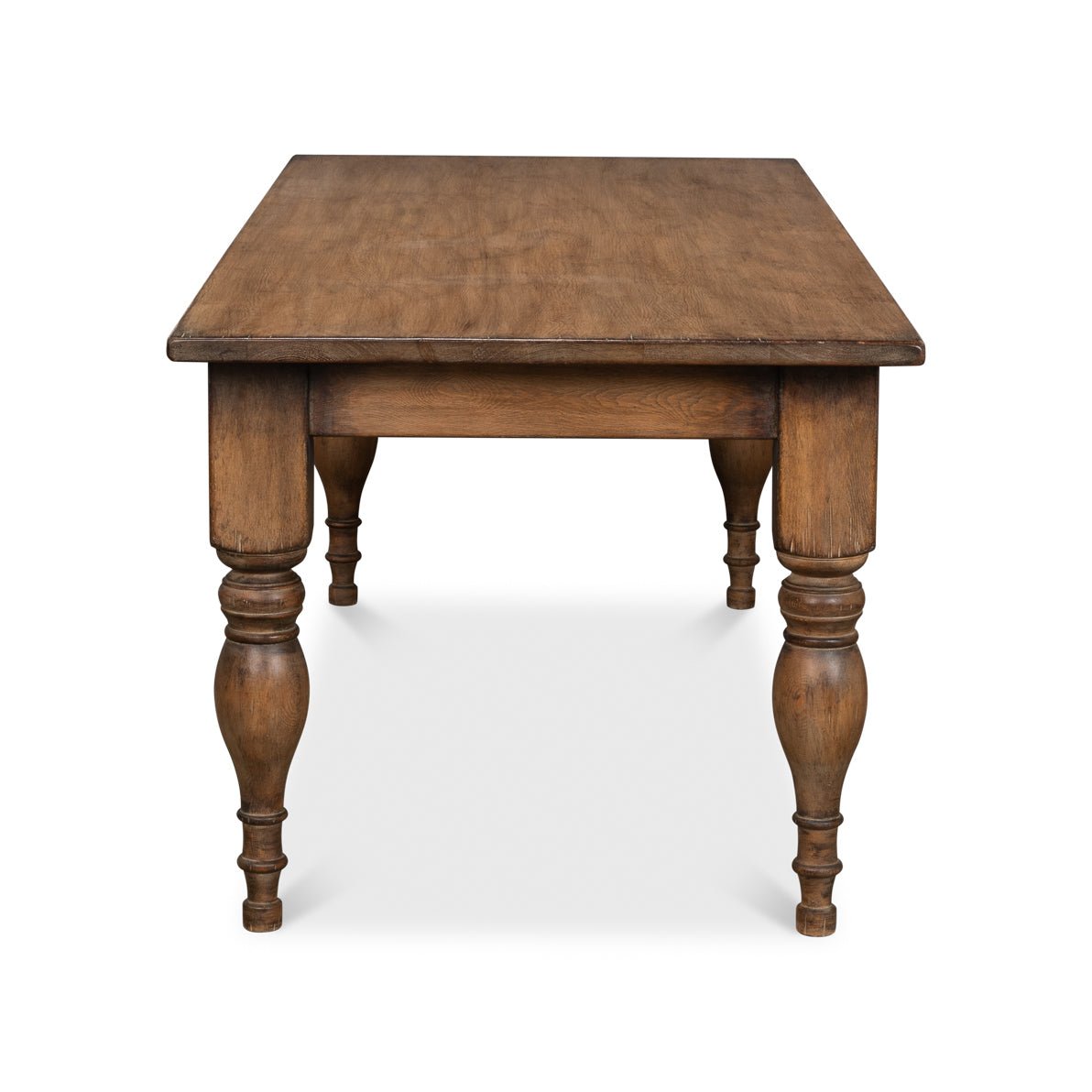 End view of French Country style dining table.