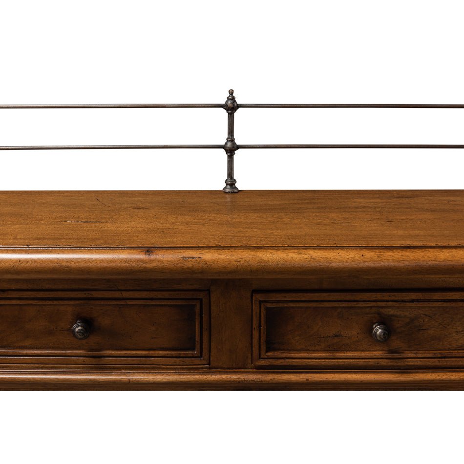 Detailed top view of drawers and metal rail on buffet.