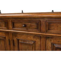 Close-up of buffet drawers and cabinet doors.