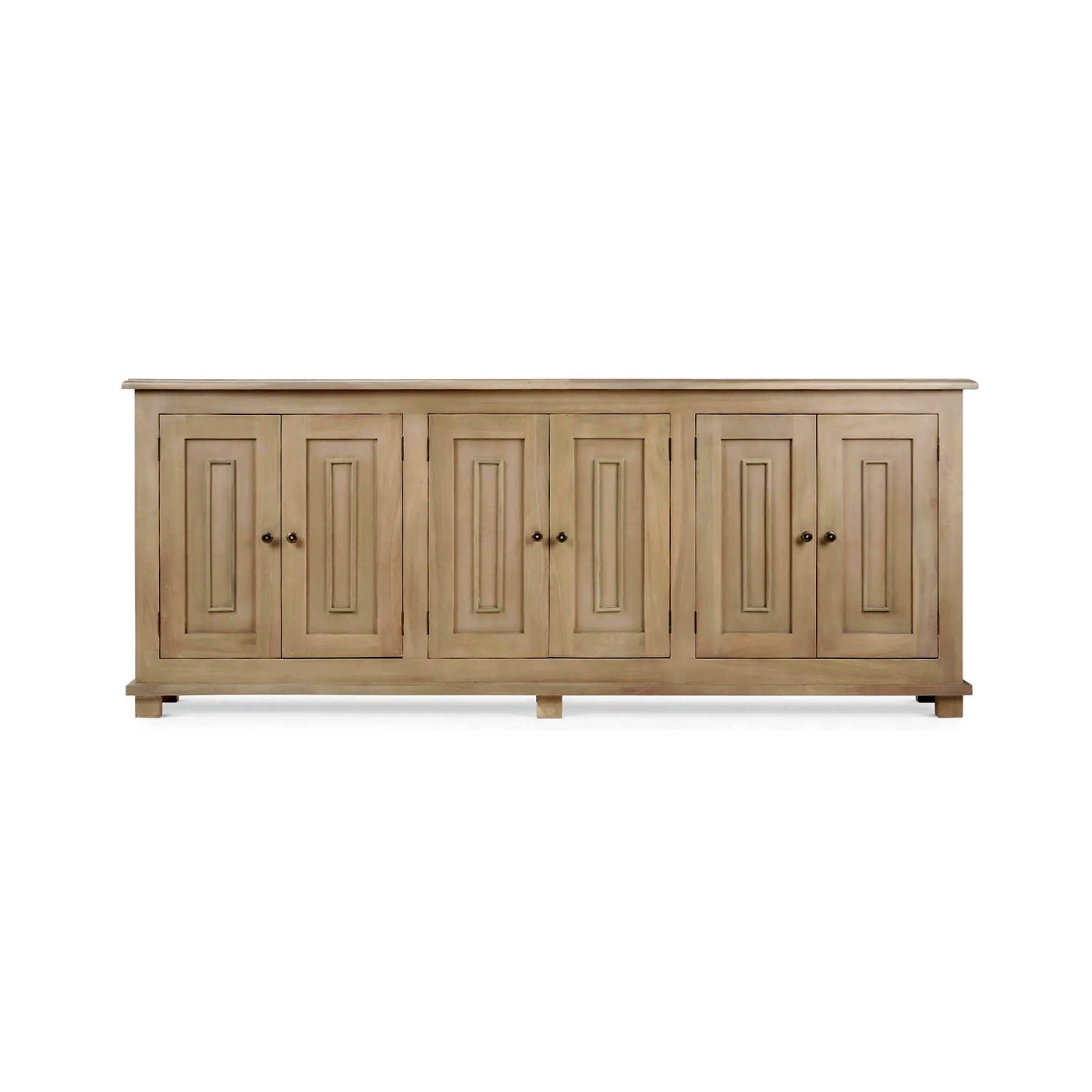 Wooden sideboard with four closed cabinet doors.