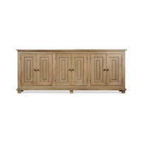 Wooden sideboard with four closed cabinet doors.