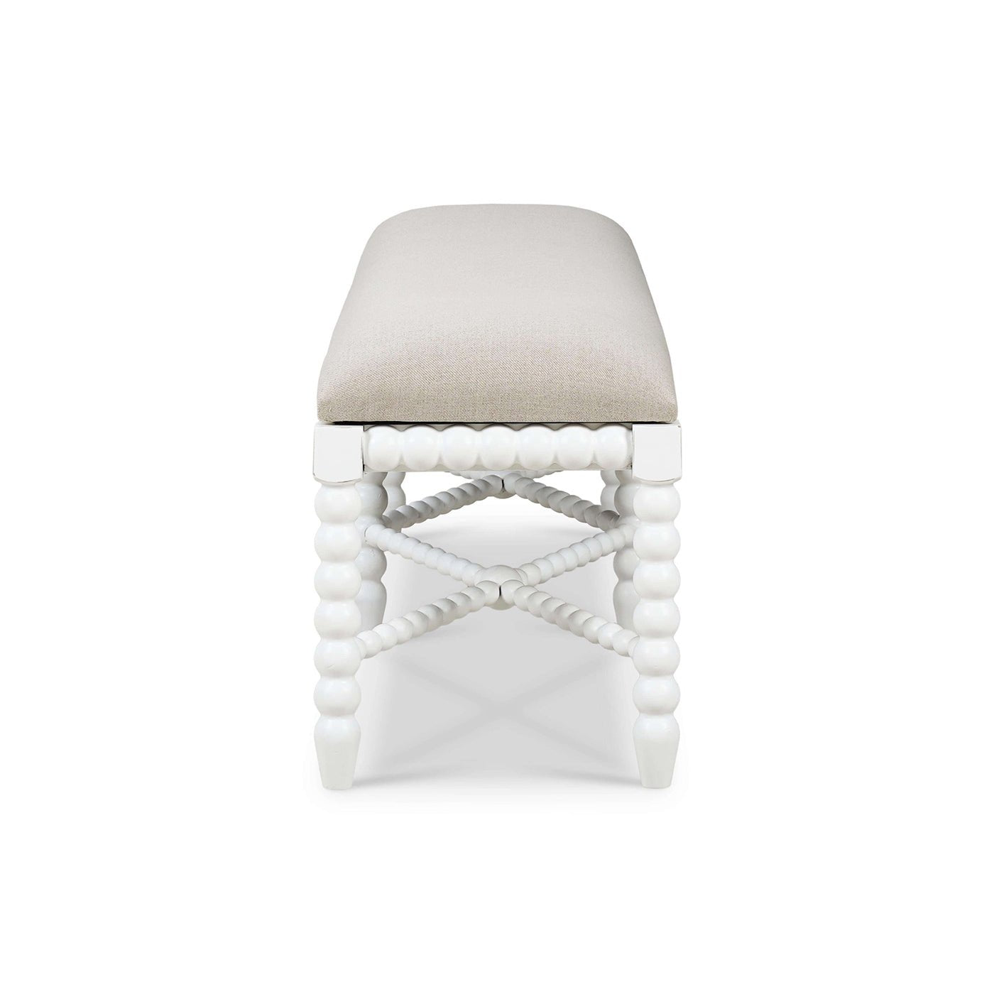 Side view of white bench with textured seat.