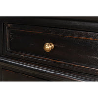 Close-up of drawer knob on painted buffet sideboard.