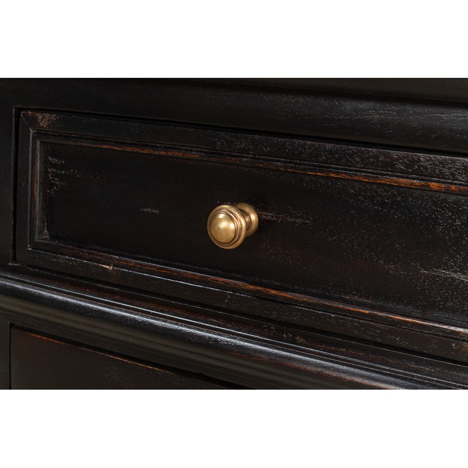 Close-up of drawer knob on painted buffet sideboard.