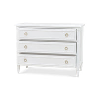 White chest of drawers, three-quarter view.