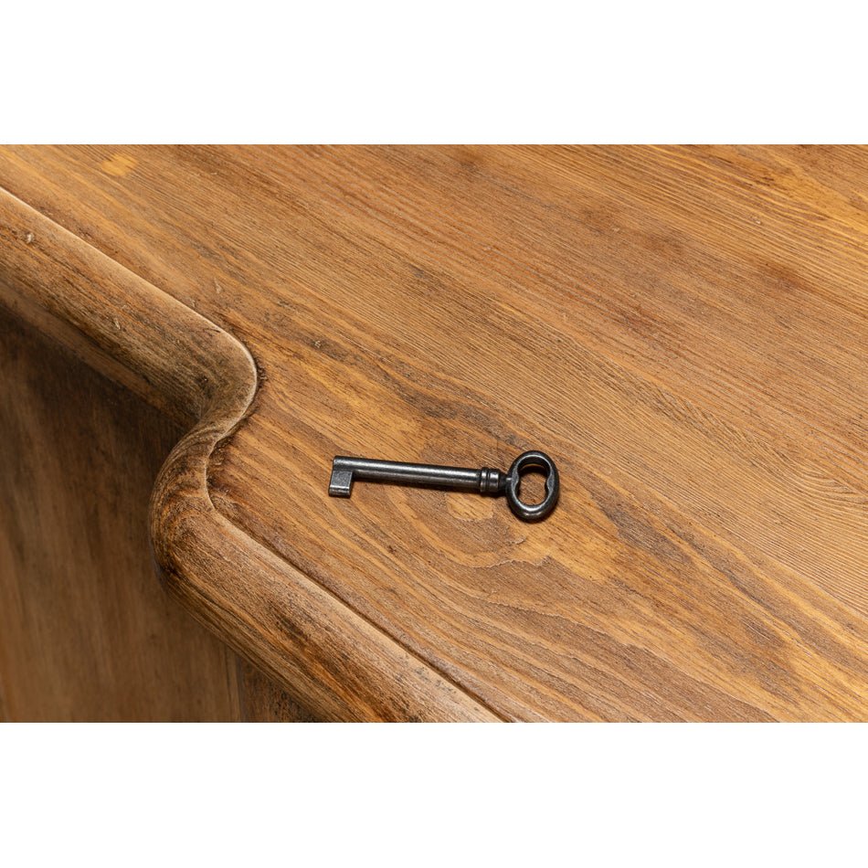 Close-up showing credenza key on top surface.