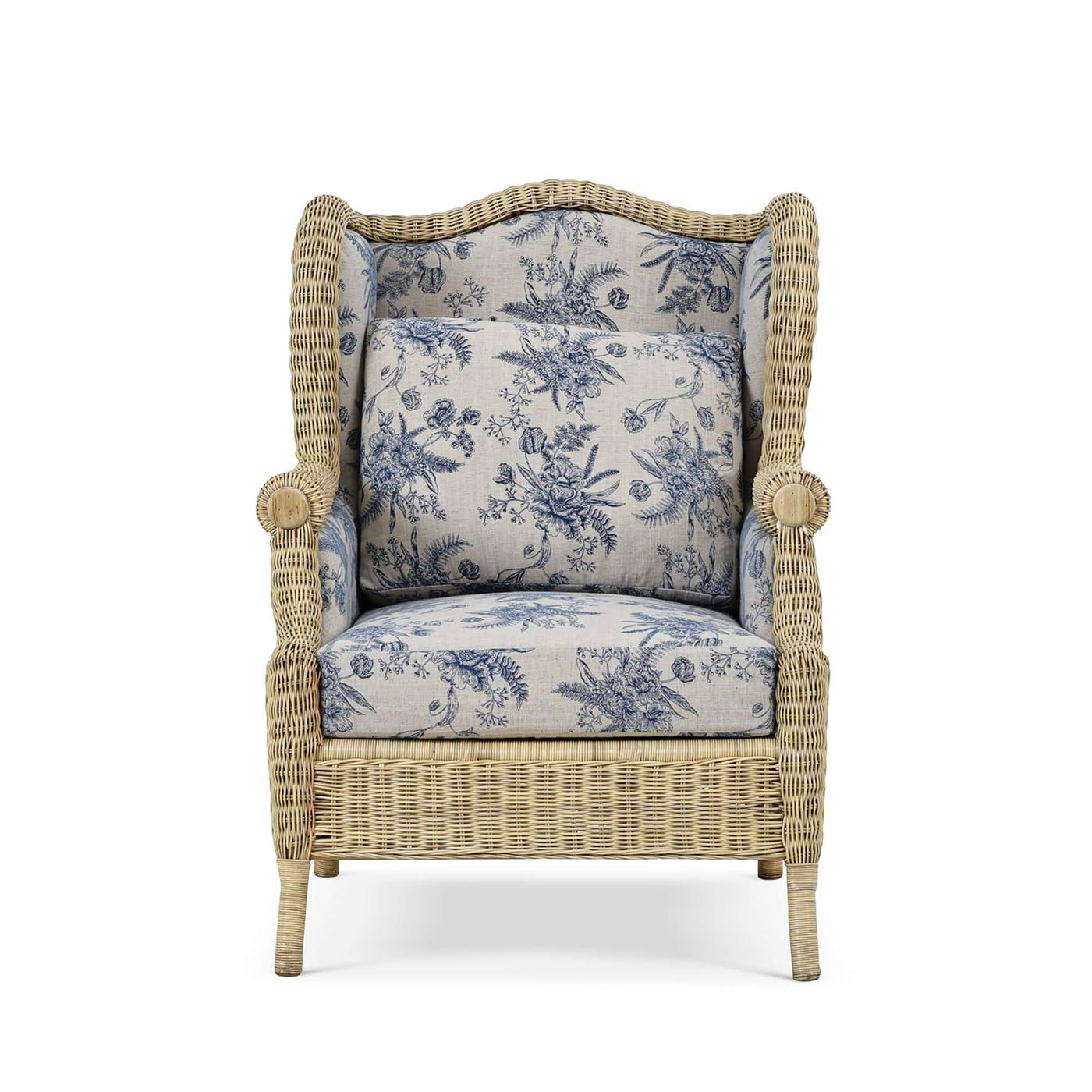 Front view of rattan wingback chair with cushions.