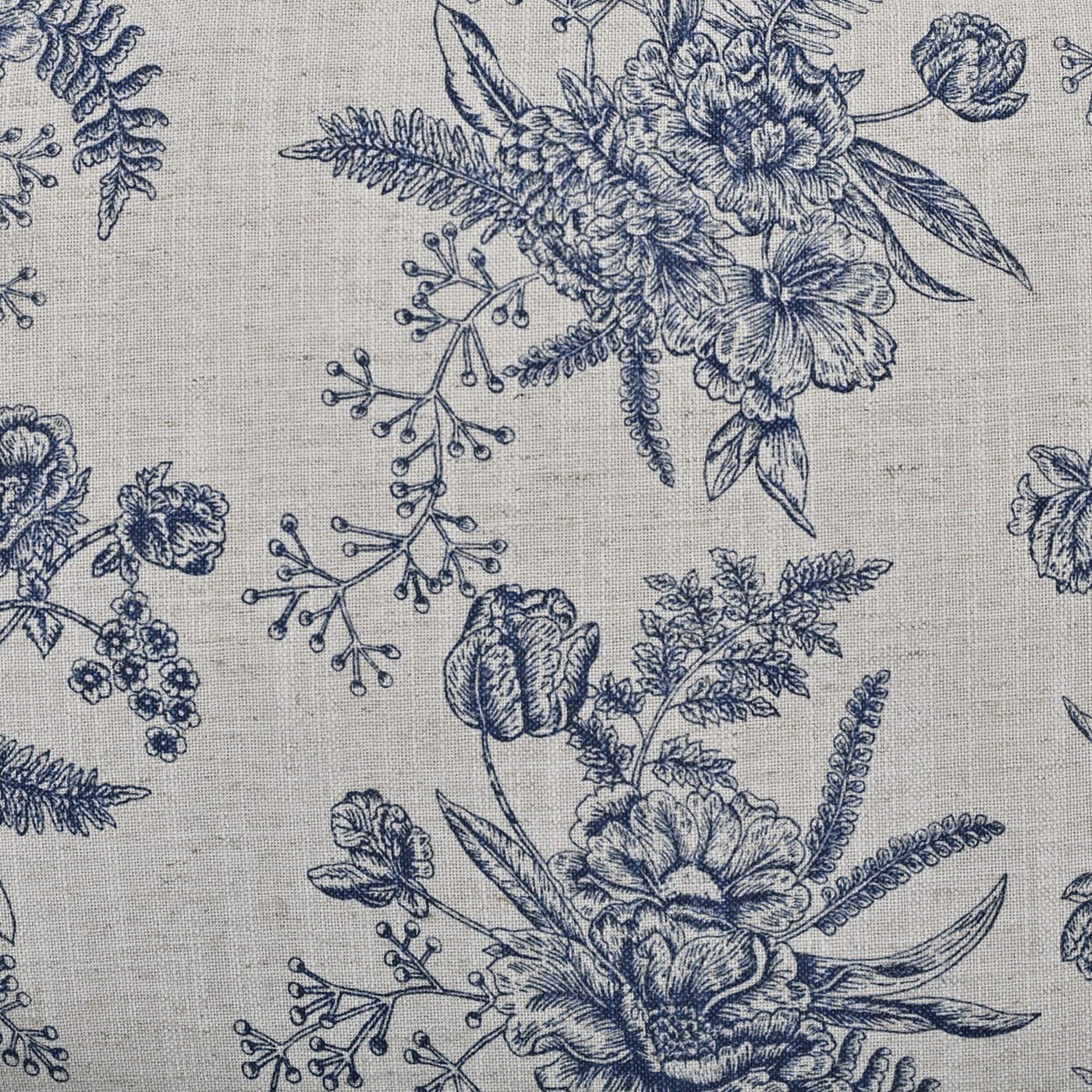 Blue floral pattern on chair cushion fabric.
