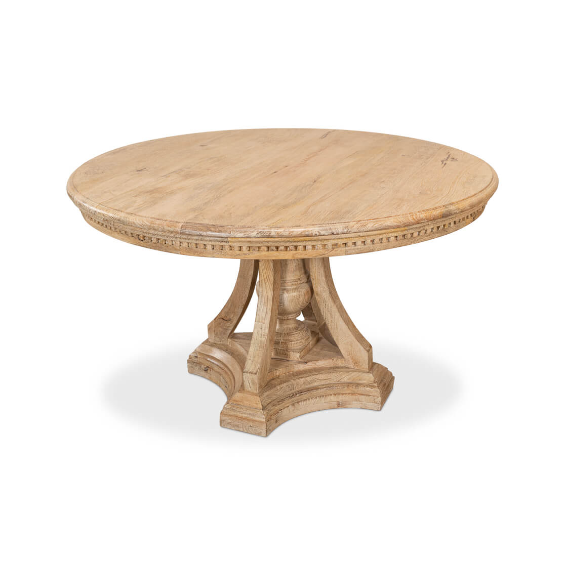 Round dining table, side perspective, pedestal support structure.