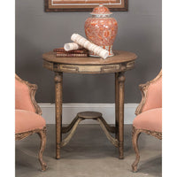 Styled French country tea table with decor setup.
