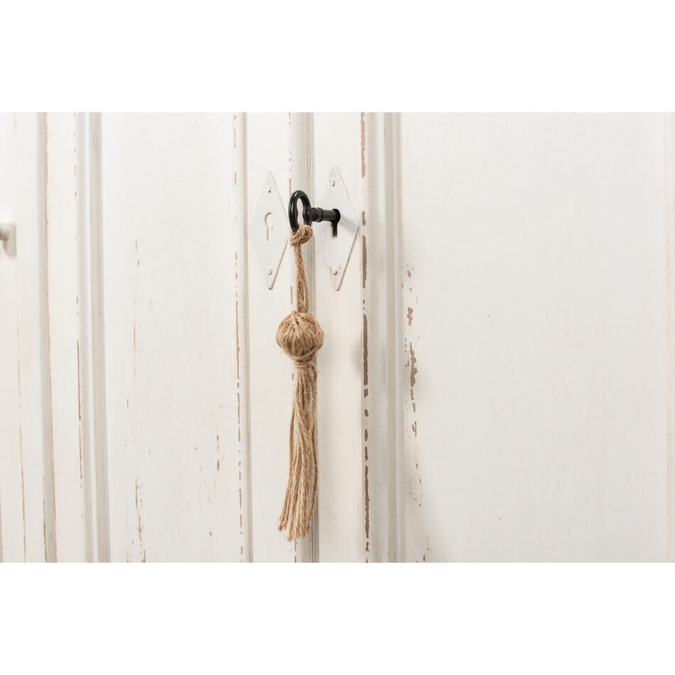 French country sideboard, door detail with tassel, close-up
