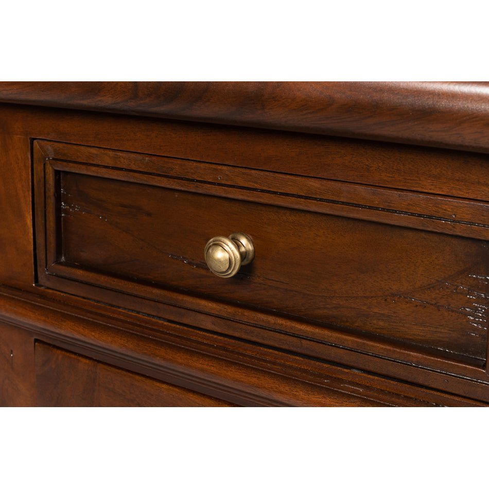 Detail of drawer knob on walnut buffet sideboard.