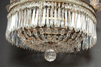 Bottom view of chandelier, intricate crystal arrangement.