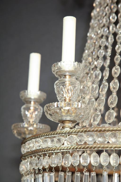 Close-up of ornate crystal details on chandelier.