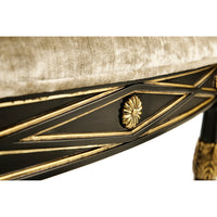 Seat edge detail of French Empire armchair, floral design.