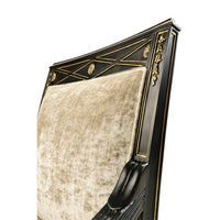 Top detail of French Empire armchair, black and gold.