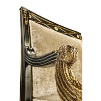 Side view of French Empire armchair armrest carving.