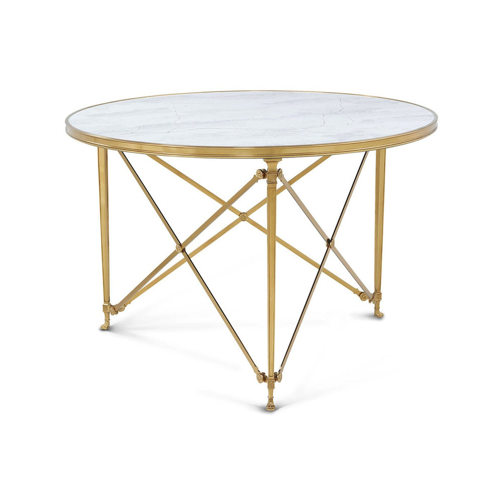Round marble top table with gold metal legs.