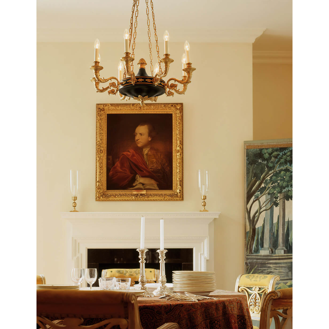 French Empire chandelier in dining room setting, classic decor.