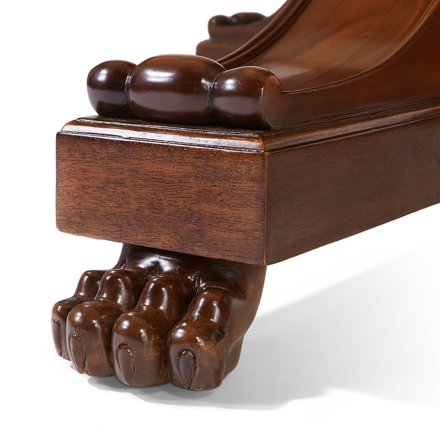 Close-up of French Empire table carved claw foot.