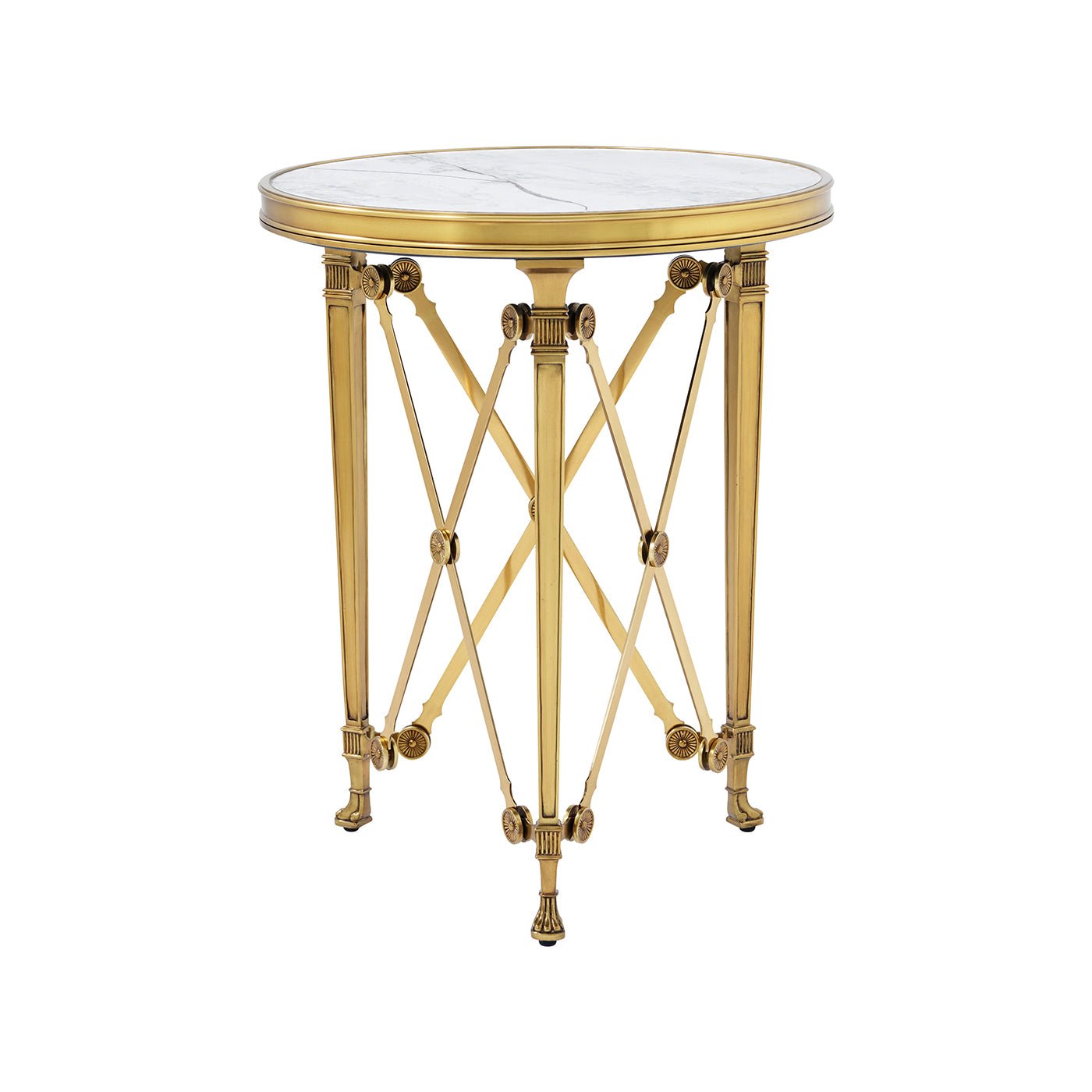 Close-up of round accent table's intricate gold design.